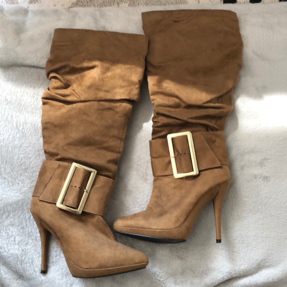 Knee high spiked boots